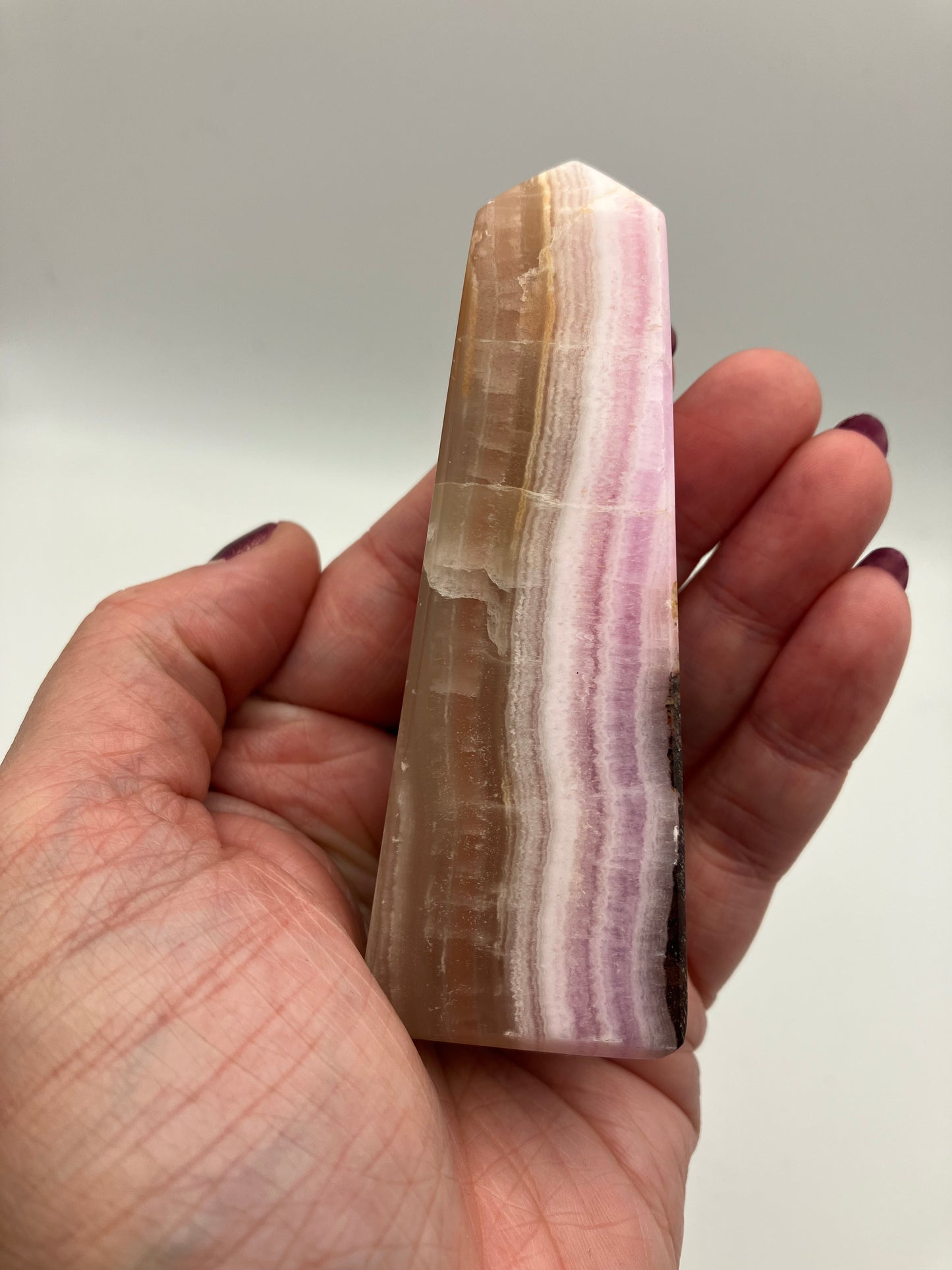 Rare pink aragonite tower with brown aragonite and white calcite. 9cm 141g