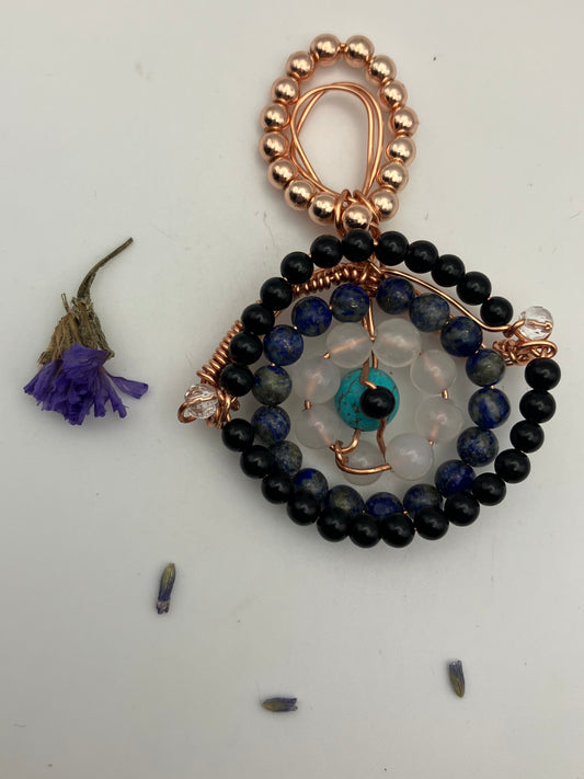 Copper Wire wrapped and beaded ‘Evil eye’ pendant. Black Onyx, Turquoise, Lapis Lazuli and Selenite