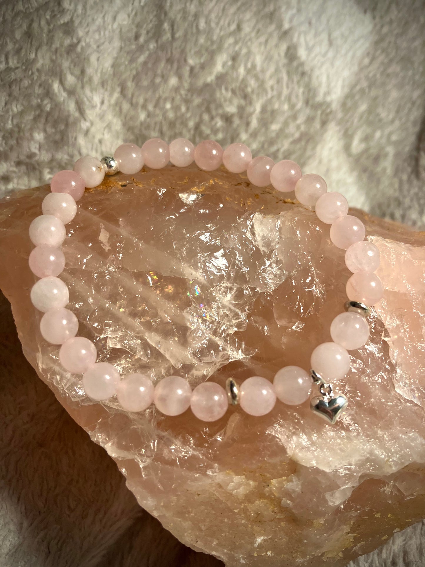 Crystal heart chakra healing bracelet. Rose Quartz. 925 sterling silver and real gemstone beads.