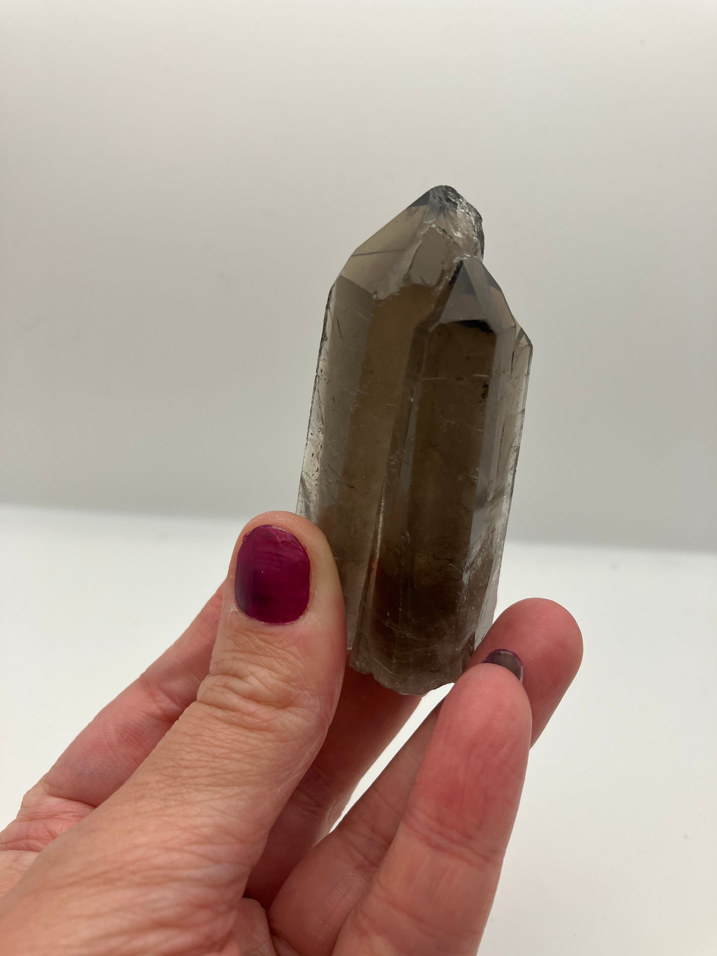 Very dark, natural Smoky Quartz triple . Weight tbc