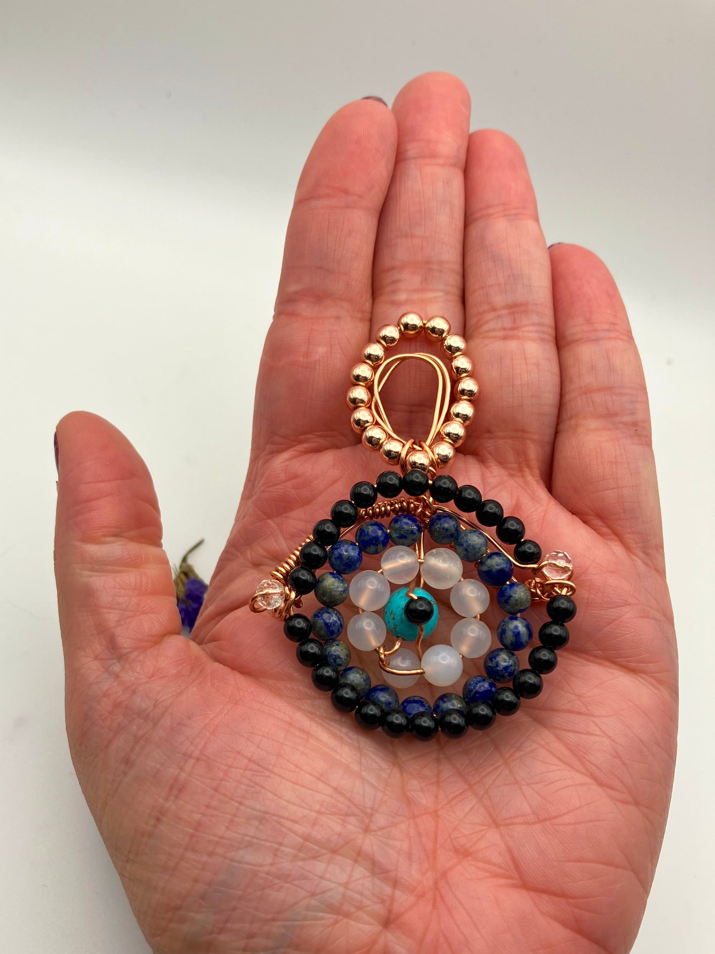 Copper Wire wrapped and beaded ‘Evil eye’ pendant. Black Onyx, Turquoise, Lapis Lazuli and Selenite