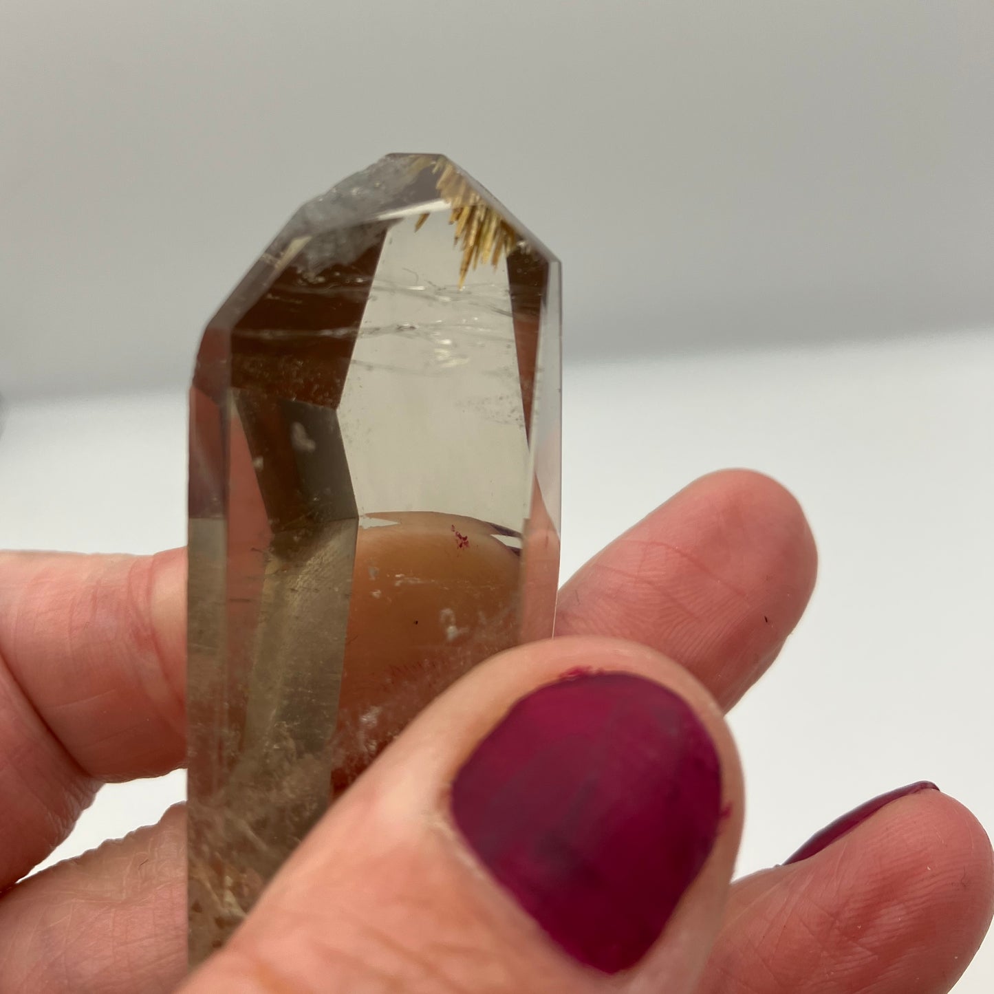 Smoky Quartz Freeform with little golden rutile inclusion at tip.