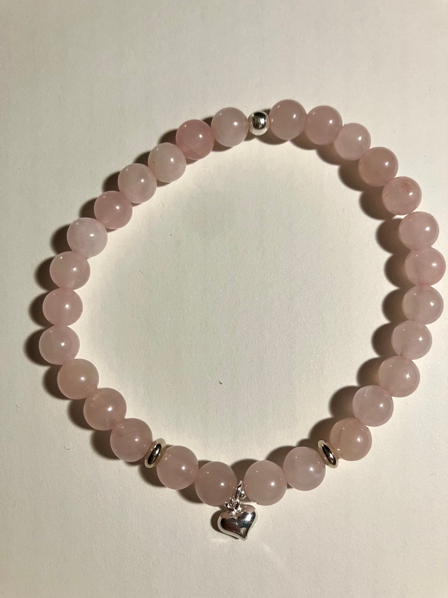 Crystal heart chakra healing bracelet. Rose Quartz. 925 sterling silver and real gemstone beads.